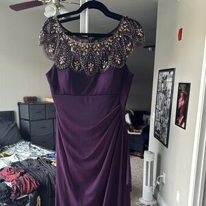 Elegant Purple Dress with Embellished Neckline